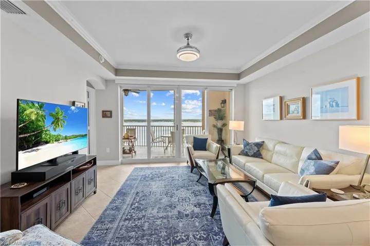 Tiled living room with crown molding