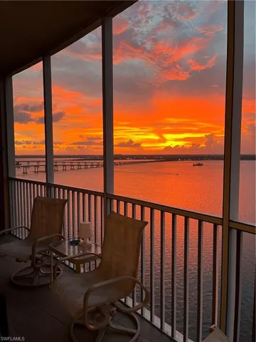 Balcony at dusk with a water view