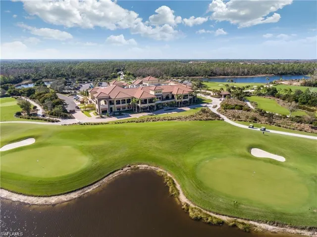 Bird's eye view with a water view and golf course view