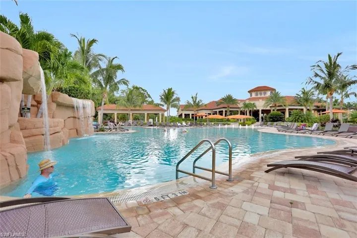 Community pool featuring a patio area