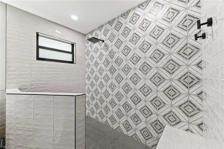 Bathroom with tiled shower