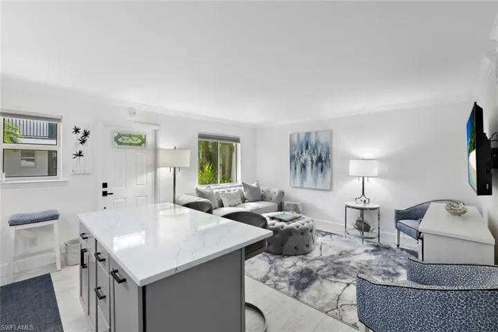 Bright living area open to the kitchen making it great for entertaining guests.