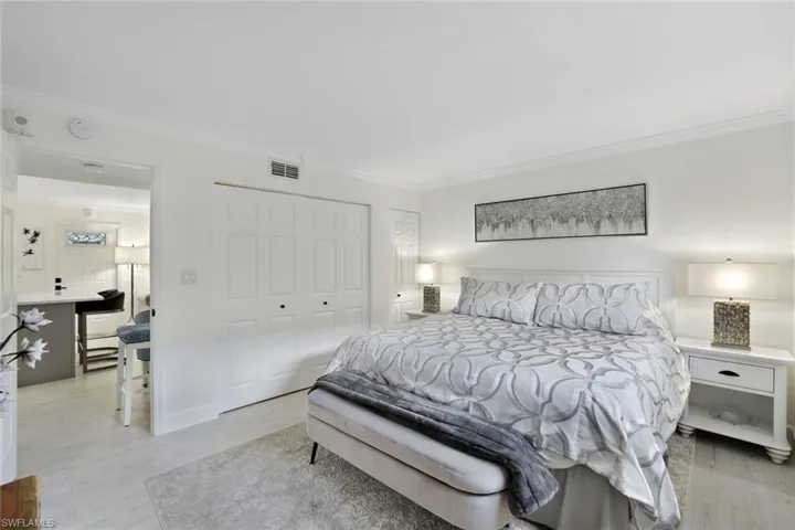 Bedroom has updated finishes and direct access to the main living area.