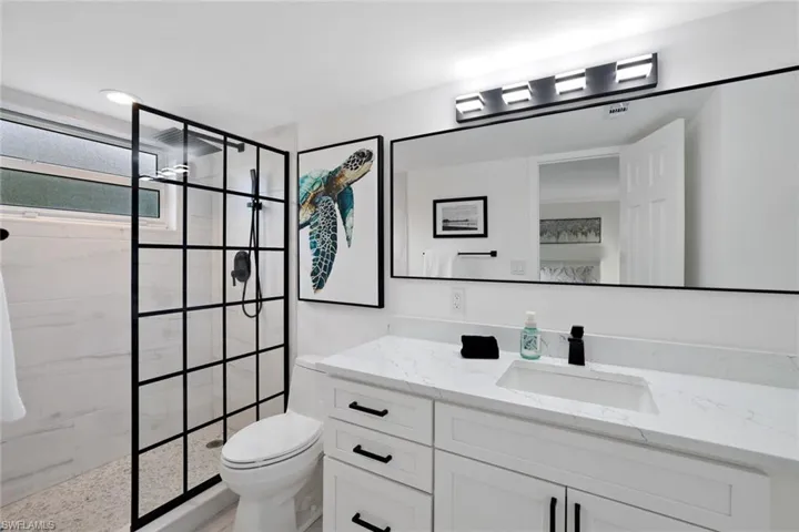Spacious bathroom with modern finishes.