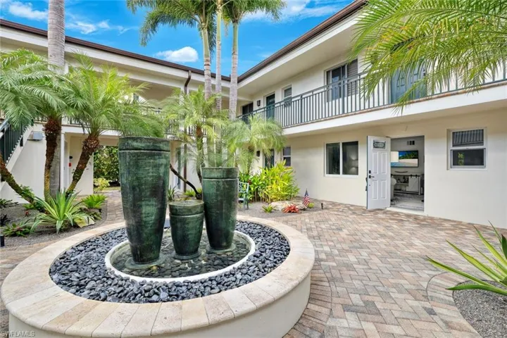 Serene courtyard fountain offering a peaceful backdrop as you come and go.