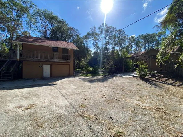 View of yard with a garage