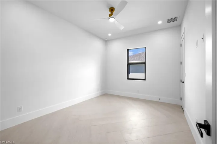 Unfurnished room featuring recessed lighting and a ceiling fan