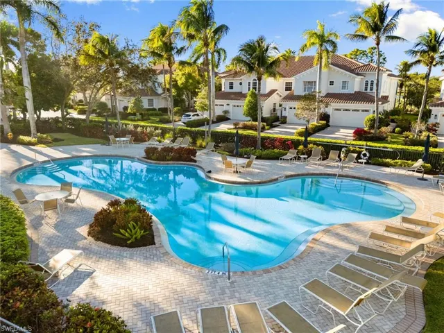 Community pool with a patio area