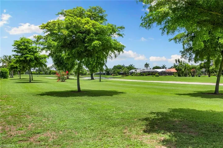 View of home's community featuring a yard