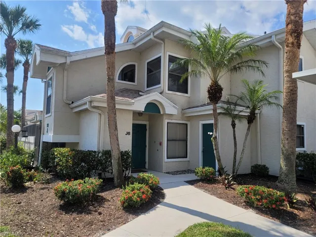 View of front of property featuring stucco siding