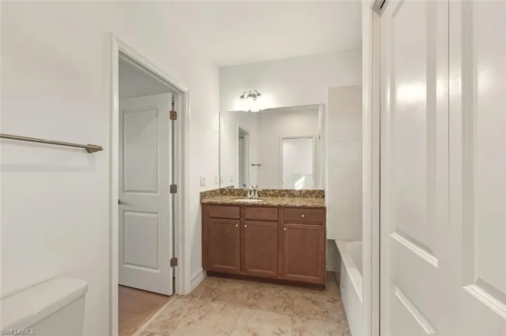 Full bathroom with vanity and tub / shower combination