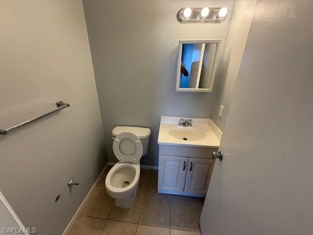 Bathroom featuring vanity and tile patterned floors
