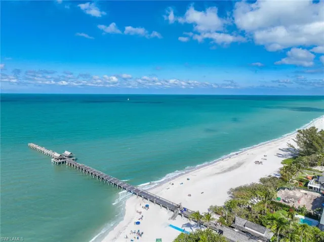 Bird's eye view of waterfront with a beach