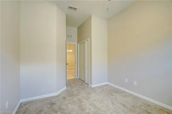 Spare room featuring light tile flooring