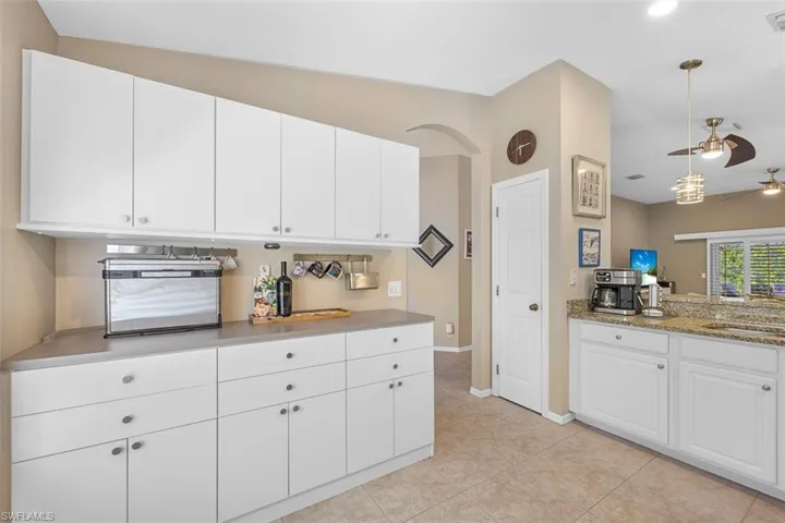 New custom cabinetry, granite countertops, & stainless steel appliances.