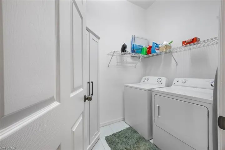 Laundry room with plenty of storage.
