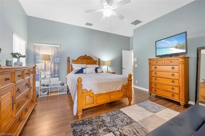 Primary bedroom with remodeled ensuite bathroom.