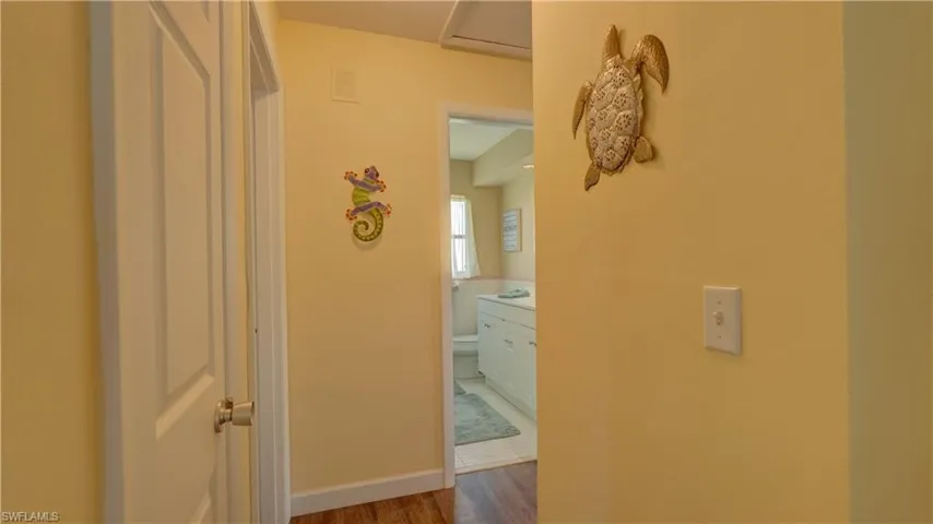 View of hallway leading to bedrooms and guest bathroom