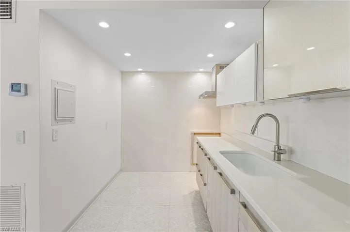 Bright Beautiful Kitchen with Chic Tile Wall