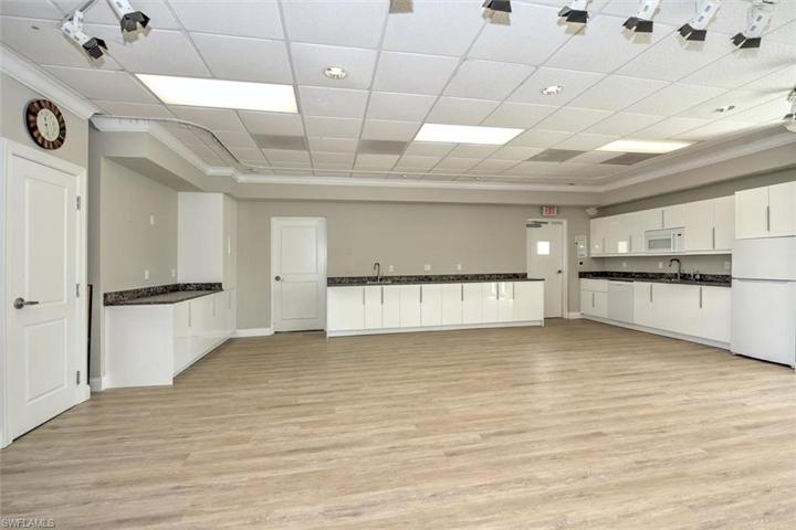 community party room - all flooring and cabinetry