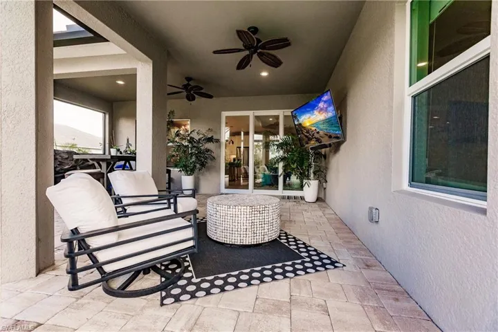 View of patio / terrace featuring a ceiling fan