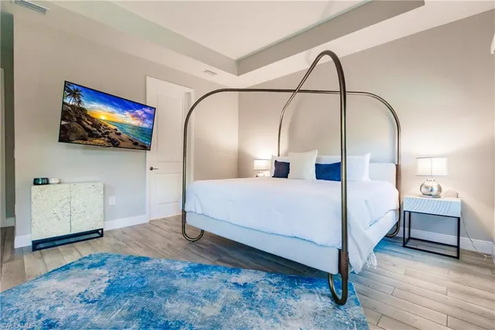Bedroom with light wood-style floors