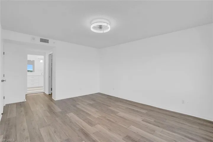 Unfurnished room with light wood-style flooring