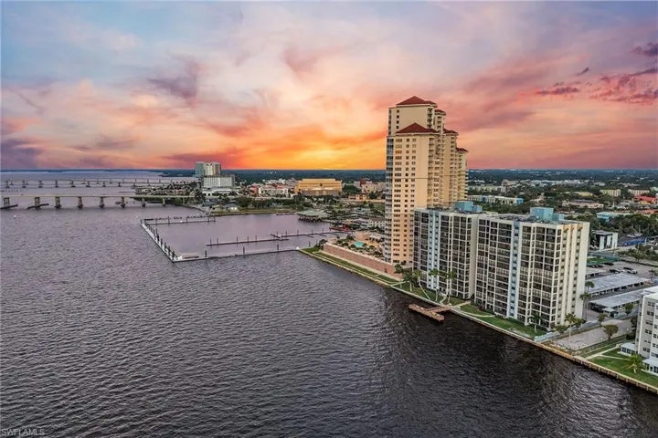 Aerial view at dusk of a water view and a city view