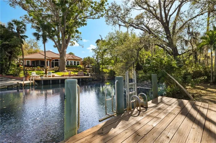 Dock featuring a water view