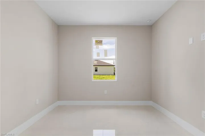 View of tiled empty room