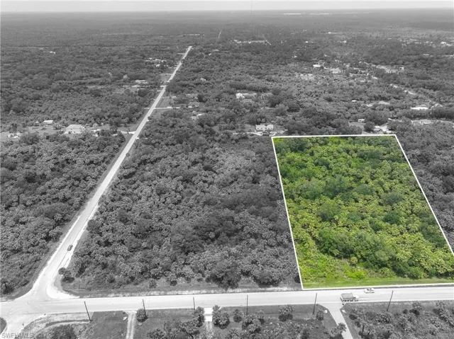 Aerial overview of property's location featuring property boundaries highlighted