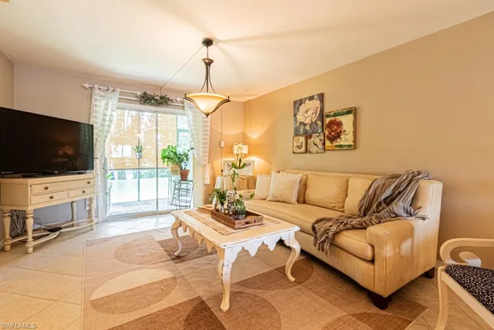130 Cypress Way E 1, Naples, Florida 34110