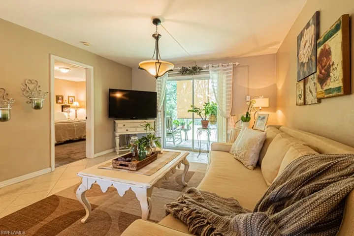 130 Cypress Way E 1, Naples, Florida 34110