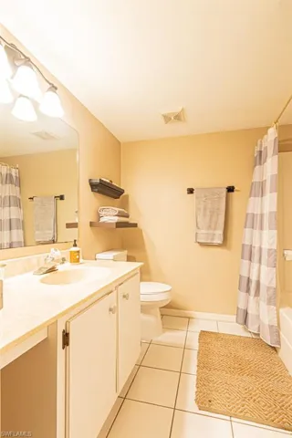 130 Cypress Way E 1, Naples, Florida 34110