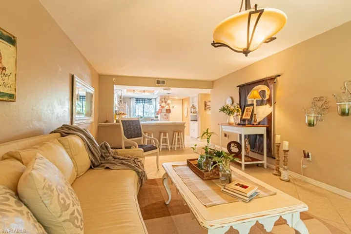 130 Cypress Way E 1, Naples, Florida 34110