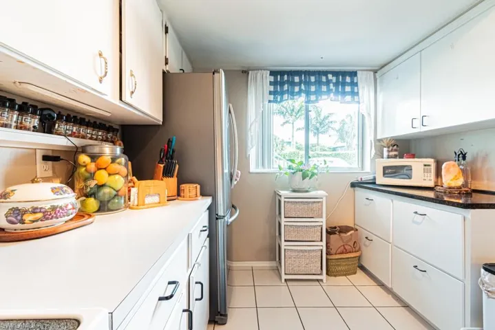 130 Cypress Way E 1, Naples, Florida 34110