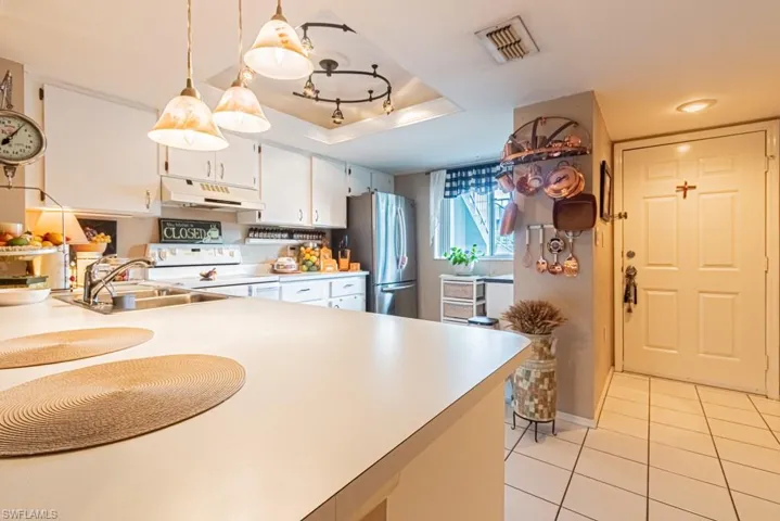 130 Cypress Way E 1, Naples, Florida 34110