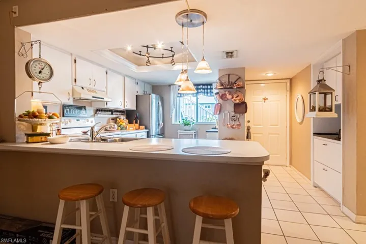 130 Cypress Way E 1, Naples, Florida 34110
