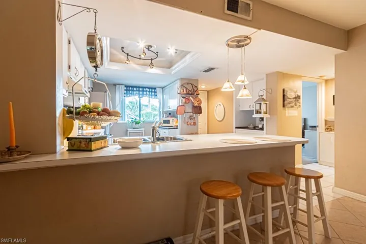 130 Cypress Way E 1, Naples, Florida 34110