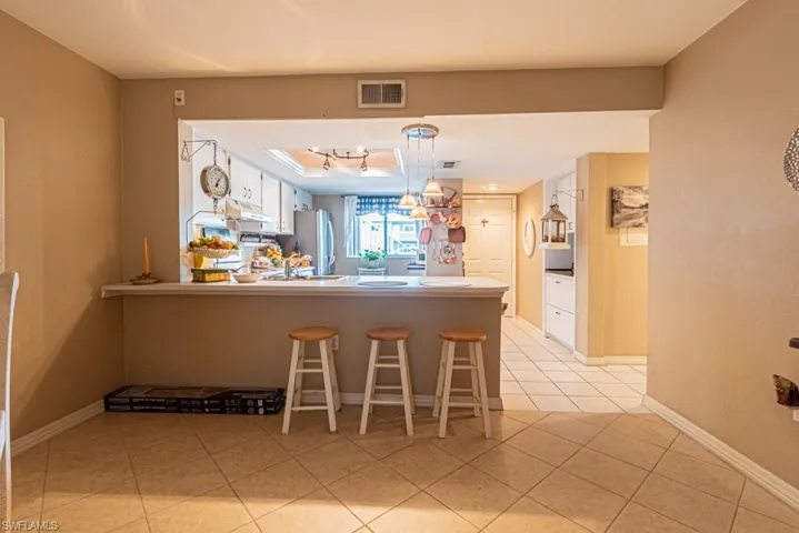 130 Cypress Way E 1, Naples, Florida 34110