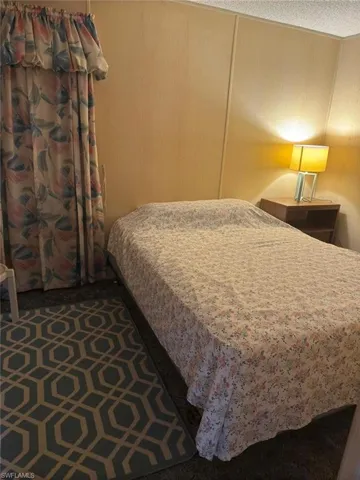 Bedroom featuring a textured ceiling