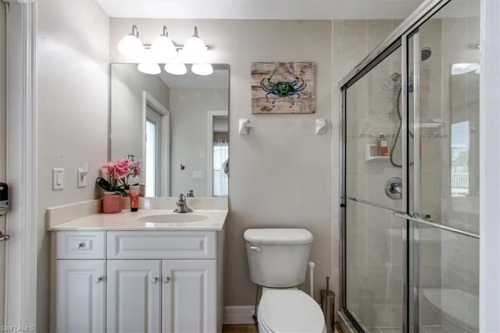 Full bathroom featuring vanity and a shower