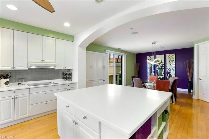 Kitchen view toward formal dining room and side lanai.