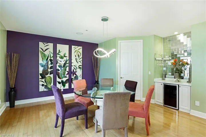 Formal dining room and bar with wine fridge.