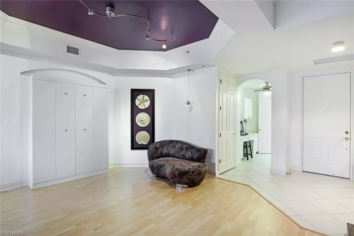 Great room view toward office has a murphy bed for extra guest space.