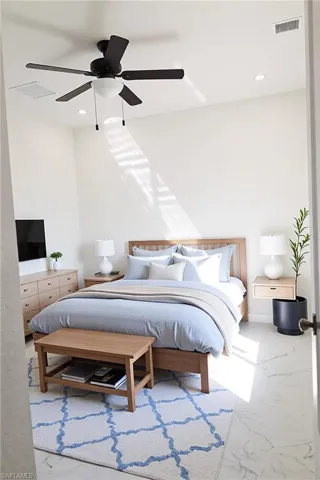Bedroom featuring recessed lighting, visible vents, marble finish floor, and ceiling fan