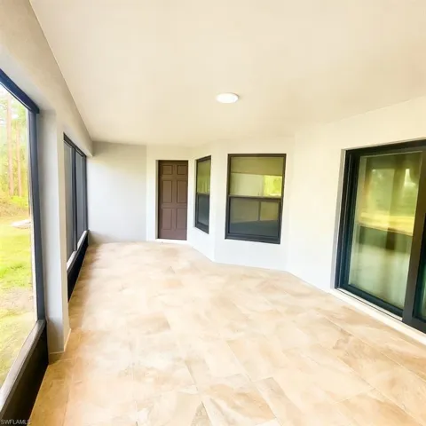 Unfurnished sunroom with plenty of natural light