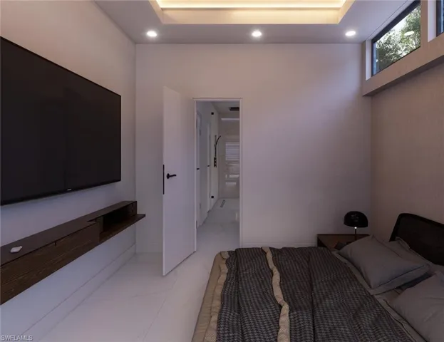 Bedroom with light marble finish floors and recessed lighting
