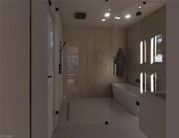Full bath featuring elevator, a soaking tub, vanity, marble finish floors, and a walk in shower