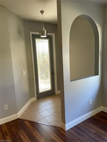 Entryway featuring flooring / wood-style floors
